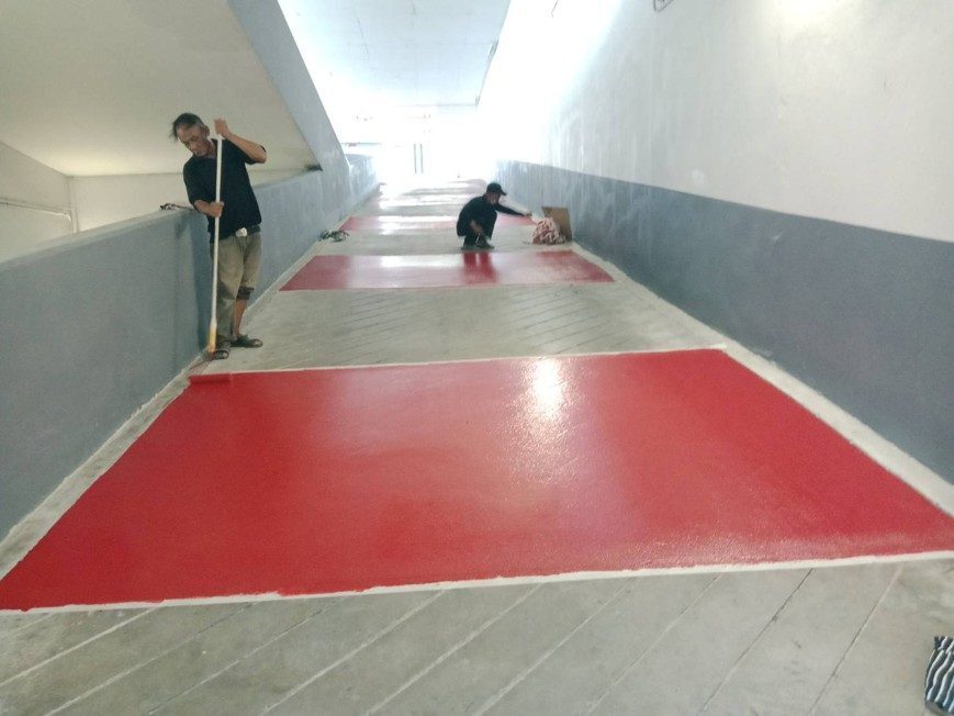 Non-slip pavement in progress